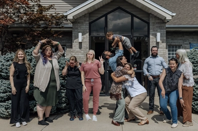 Chiropractor Michigan City IN Kristina Kauffman Ferguson Grant Ferguson With Team Contact Us Kristina Kauffman Ferguson and Grant Ferguson With their ream.